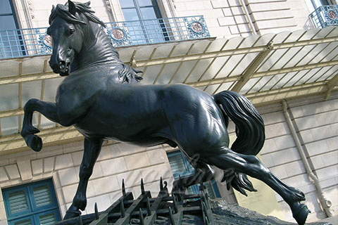 Decorated bronze jumping horse sculpture for sale