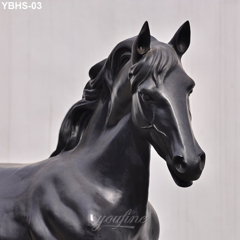 Close-up view of a detailed black bronze horse sculpture with elegant craftsmanship and smooth surface finish against a light background.