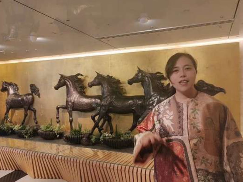 Bronze lion sculpture at the entrance of a luxury hotel in Dubai