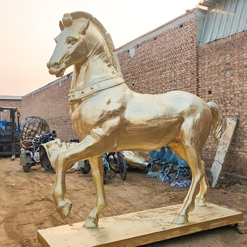 The welded and polished standing horse sculpture (with one leg raised)