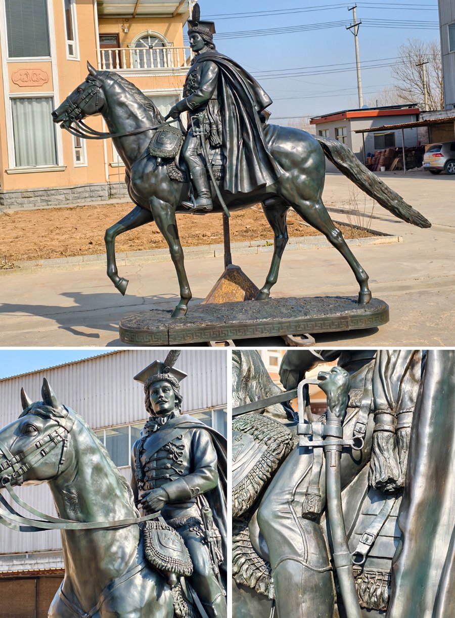 A detailed bronze statue of a horseman with elaborate attire, seated atop a horse. The statue showcases ornate craftsmanship and is set in an outdoor area with buildings in the background.
