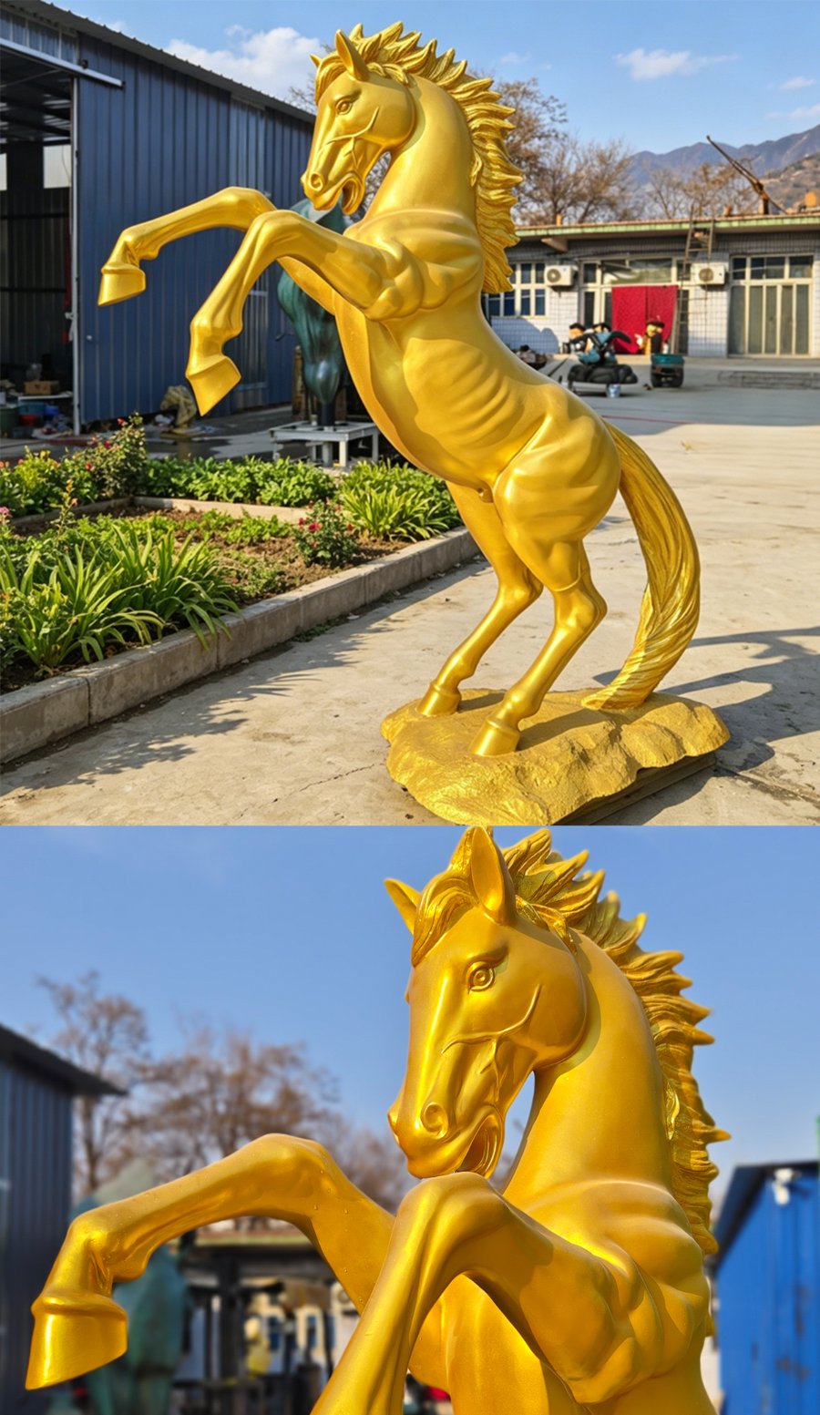 A vibrant golden horse sculpture rearing on its hind legs, placed outdoors in a landscaped area with industrial structures in the background.