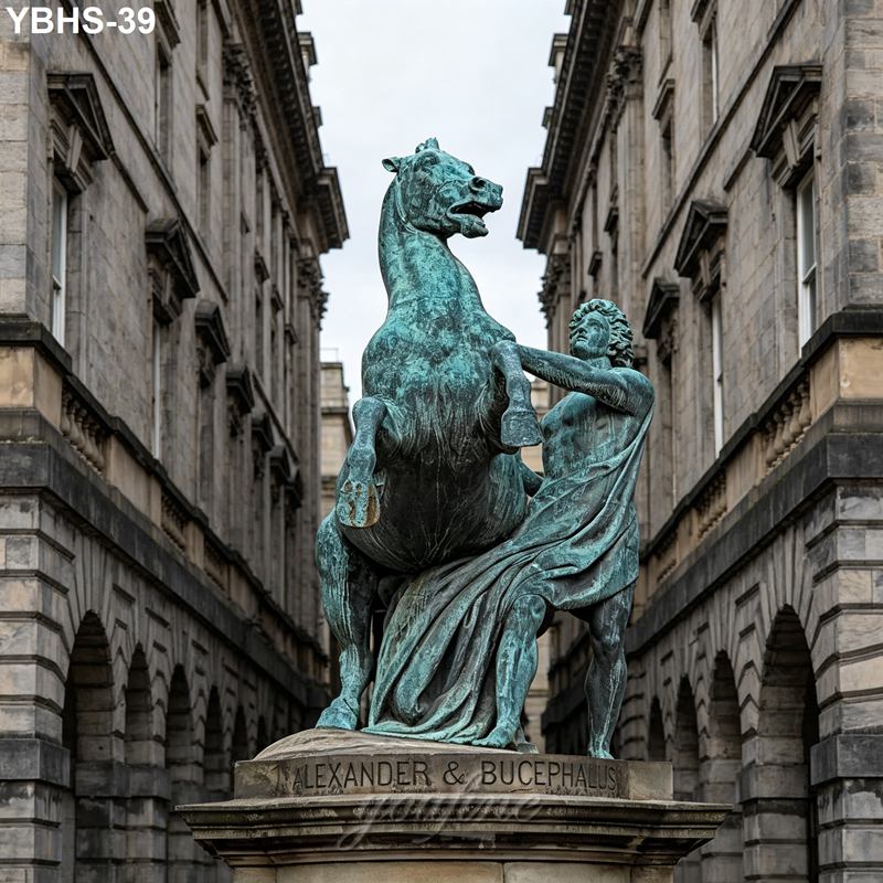 Bronze sculpture of Alexander and his horse Bucephalus, set against a backdrop of classical stone buildings with detailed architecture.