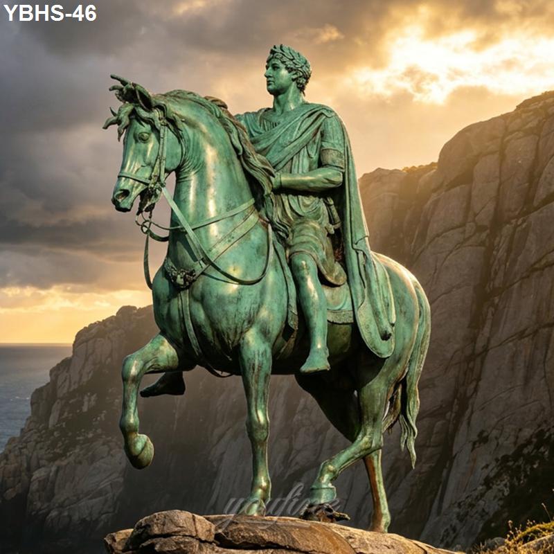 Bronze equestrian statue of a rider in classical attire, with scenic cliffs and a dramatic sunset sky in the background.