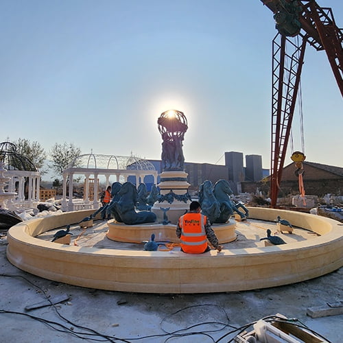 The workers are performing a normal trial installation of the bronze horse fountain
