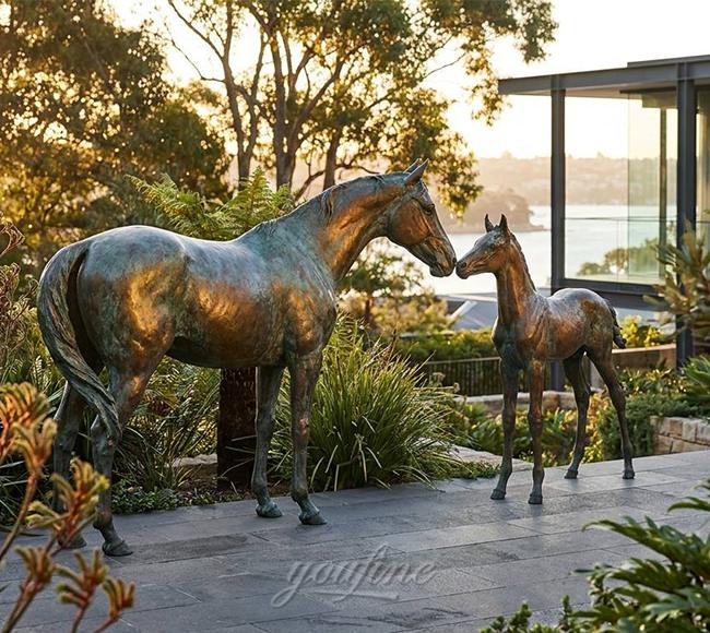 Compact natural weathered bronze horse sculpture on a residential garden terrace in Sydney, Australia