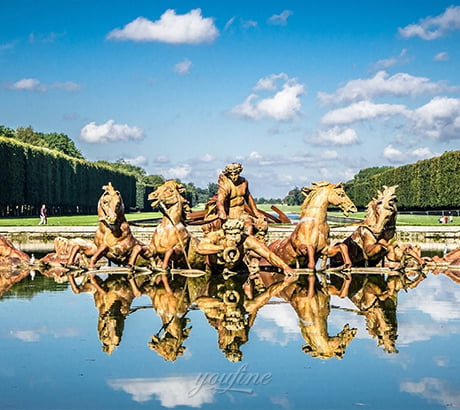 Bronze horse fountain in a landscape development