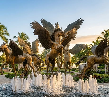 Bronze horse fountain at a hotel resort