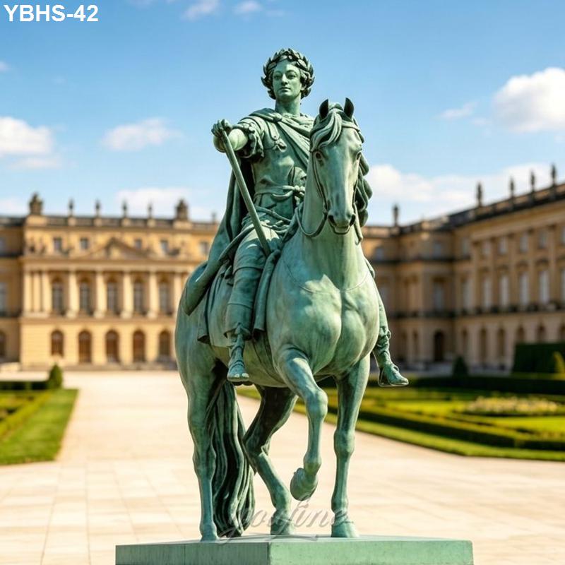 Bronze equestrian statue of a rider on horseback with ornate details, set against the backdrop of a grand castle and gardens under a bright blue sky.