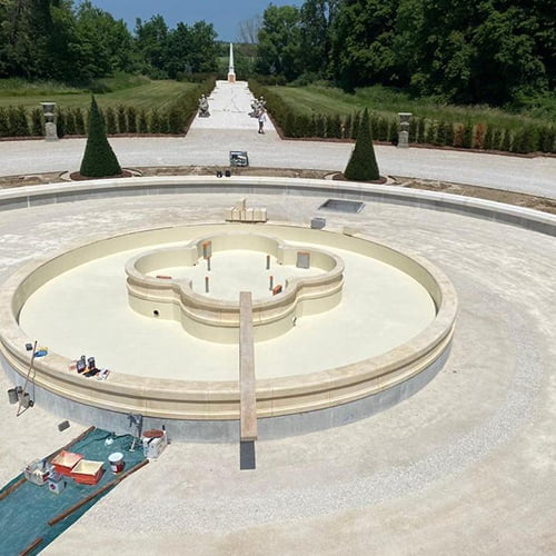 A large circular fountain under construction