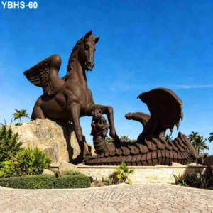 Majestic bronze Pegasus battling a dragon on a stone pedestal surrounded by greenery under a blue sky.