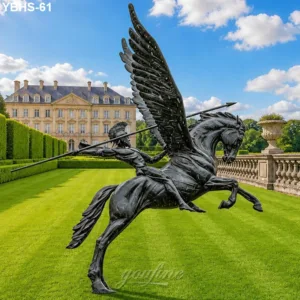 Bronze statue of a winged horse with a rider holding a spear, set on a lush green lawn in front of an elegant mansion.